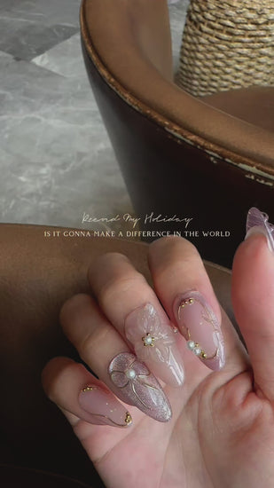 Elegant pearl coffin nails with glossy finish for weddings or parties